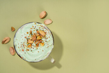 Vegan pistachio milk coffee latte. Iced and hot coffee drinks with plant based whipped pistachio...