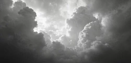 Foto auf Acrylglas Hotel Dramatic black, white photo of cumulonimbus clouds in sky. Moody monochrome weather nature wallpaper with atmospheric stormy overcast cloudscape, sunlight behind. Concept of freedom, relax at summer  © miss irine