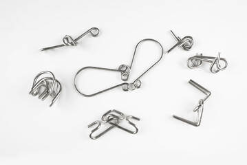 Wire Puzzles (Ring Puzzle) on White Background.