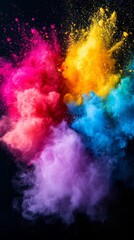 A vibrant explosion of colored powder creates a stunning visual display against a dark background, showcasing shades of pink, yellow, blue, and purple.