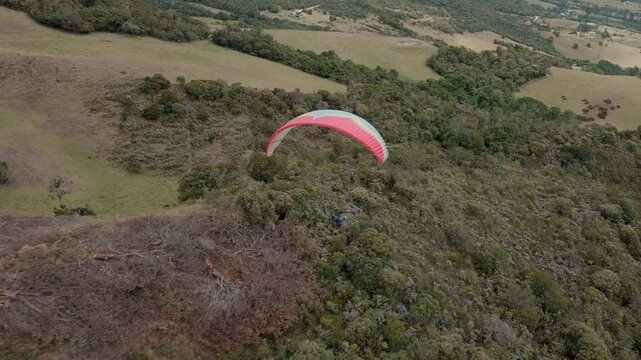 Paragliding hobby flying above the clouds enjoying leisure time couple gift experience extraordinary