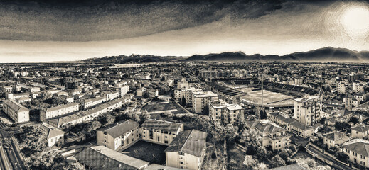 Fototapeta premium Pisa, Italy - Arena Garibaldi Stadium and city homes. Amazing panoramic aerial view at dawn