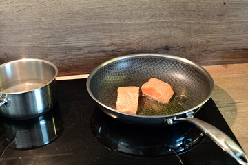 Salmon Fillet Cooking in a Frying Pan – Sizzling and Delicious