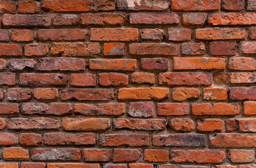 Vintage wall made of red brick.