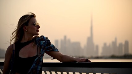 Captivating sunset view at Dubai Creek Harbour with the skyline of Dubai Business City and Burj Khalifa in the background