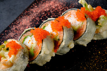 Crispy sushi rolls with fresh ingredients and bright roe invite tasty exploration