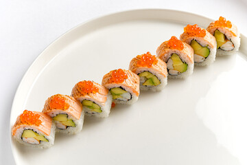 Delicious sushi rolls with fresh fish, avocado, and colorful toppings, ideal for sharing