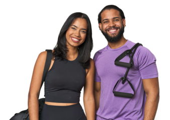 Young Latino couple ready for gym training happy, smiling and cheerful.