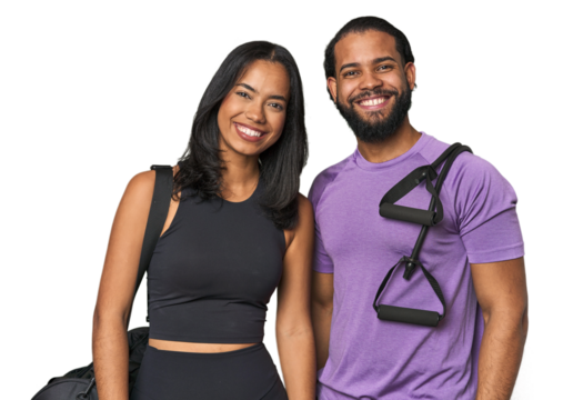 Young Latino couple ready for gym training happy, smiling and cheerful.