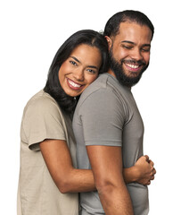 Obraz premium Latino couple in love embracing warmly in studio