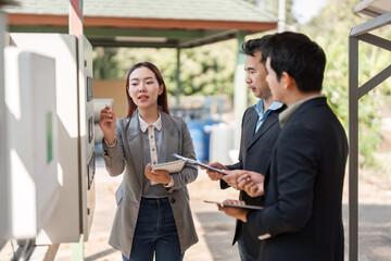 Eco-conscious business meeting. Professionals aligning on sustainable business practices in a collaborative outdoor setting.