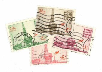Vintage used postage stamps from Saudi Arabia featuring an oil rig.