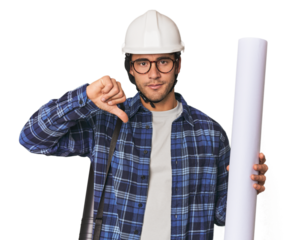Young Hispanic architect with plans showing a dislike gesture, thumbs down. Disagreement concept.