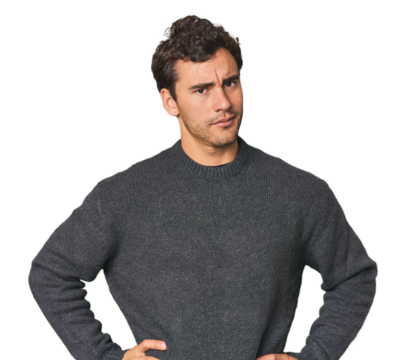 Young Hispanic man in studio confused, feels doubtful and unsure.