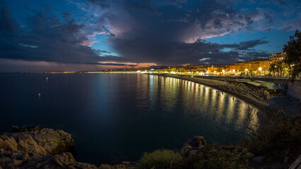 Fototapeta premium Waterfront of Nice city and Mediterranean Sea day to night timelapse