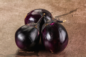 Raw violet and black eggplant