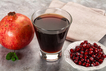 Sweet fresh pomegranate juice with fruit