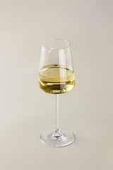 Elegant Stillness Minimalist Glass of White Wine in Soft Lighting