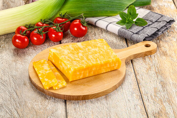 Marble yellow cheese with slices