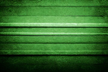 Exploring vibrant green textures and patterns in a close-up view of layered materials in a tranquil setting