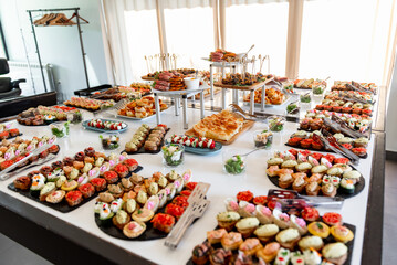 Delicious array of colorful canapes displayed elegantly at a festive buffet for a special gathering