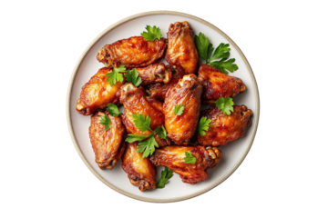 Baked chicken wings with parsley isolated on white background. Top view. transparent background, PNG, clipping path.