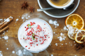 Strawberry granita with prosecco foam. Delicious sweet dessert food closeup served for lunch in modern gourmet cuisine restaurant