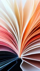   Close-up of an open book with pages folded into a heart shape on black background