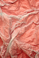 background of colored transparent shredded paper