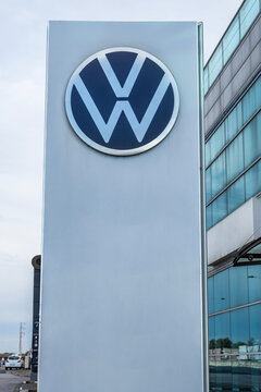 Seville, Spain; 02-15-2025: Close-up of a Volkswagen dealership logo on a pylon sign.