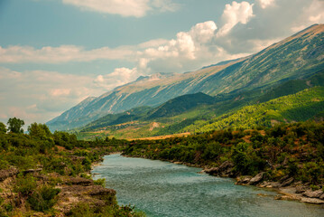 Lumi i Vjoses (Vjosa River) meanders below Mali i Nemerckes (Mount Nem&euml;r&ccedil;ka), revealing southwestern Albania&rsquo;s rugged slopes and a serene Balkan vista