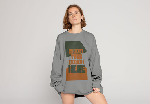 Mockup of Redhead Woman Poses Confidently in Oversized Jumper