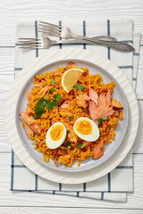 hot smoked salmon kedgeree on a grey plate