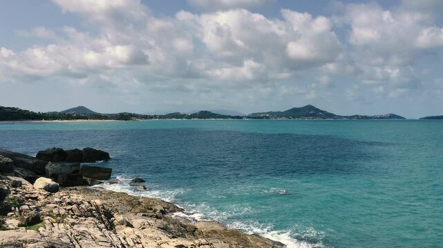 The rocky coast of the Gulf of Thailand overlooking the island