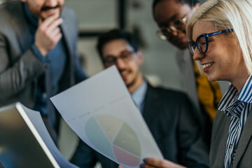 Diverse team members exchanging ideas during a strategy session