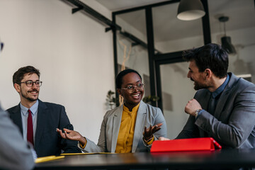 Diverse group of business professionals evaluating a candidate during an interview