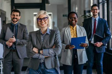Portrait of a group of diverse business people having a meeting in the office. Teamwork and success...