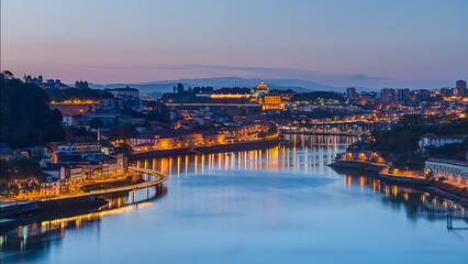 Fototapeta premium Aerial view before sunrise at the most emblematic area of Douro river timelapse.