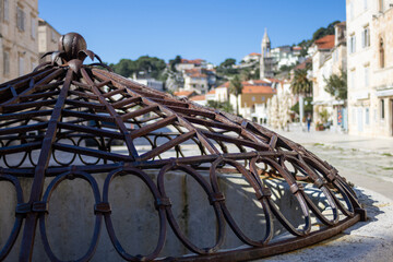 Old water well in Hvar square, Croatia. European luxury tourism concept