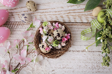 Easter decoration with quail easter eggs