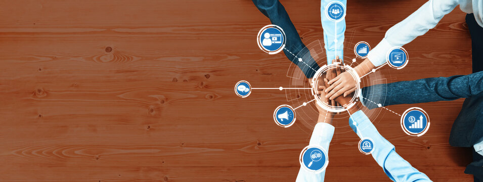 This image depicts a group of diverse professionals collaborating on a digital marketing strategy, symbolizing teamwork and innovative approaches to business growth. Amity