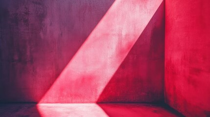 A vivid beam of pink light slices through a shadowed corner, illuminating vibrant red walls with dramatic intensity.