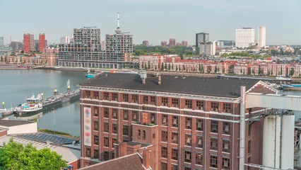 Aerial timelapse view over Maashaven with Katendrecht and Maas River. Netherlands