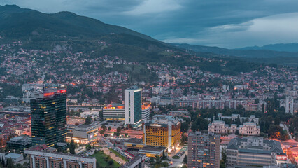 Aerial view of the southern part of Sarajevo city day to night timelapse.