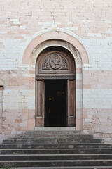 The entrance of the ancient Church Sant'Andrea in Spello, Umbria Region, Italy