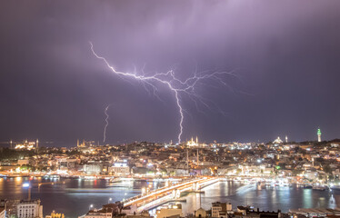 Lightning storm over Istanbul skyline at night