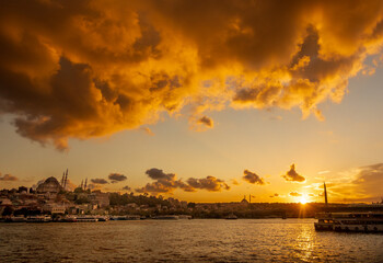 Sunset over Istanbul with dramatic sky and city silhouette