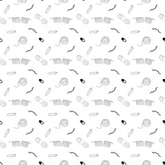 Ball of yarn and fabric on knitting needles. Doodle style. Seamless pattern.