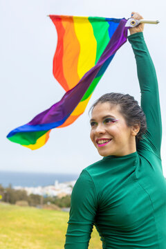 Woman Celebrates Pride with Colorful LGBTQIA+ Dance Display