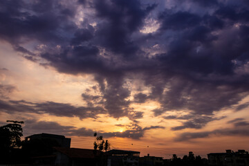 Colorful dramatic sky with cloud at sunset. Skyline at sunset.